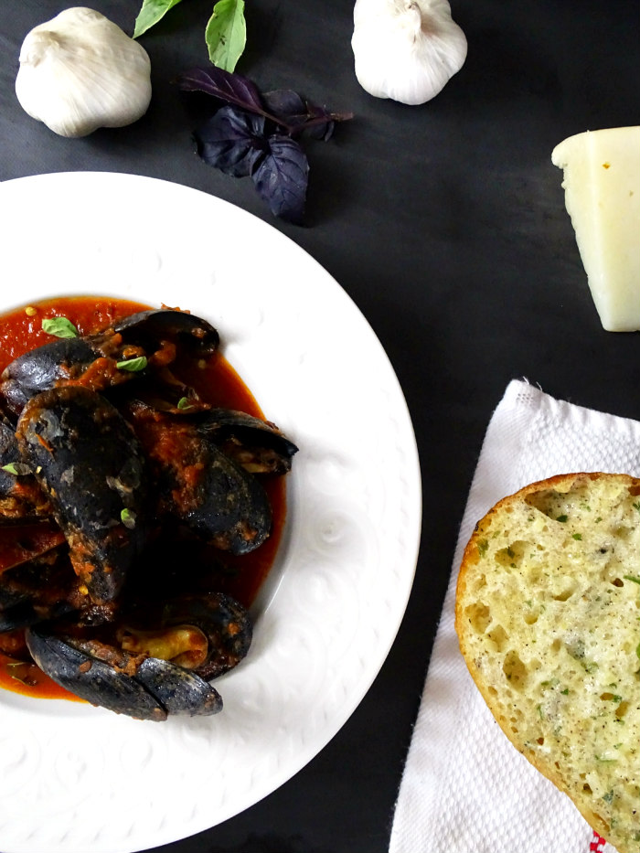 Turn up the heat this summer with this Spicy Summer Mussels recipe! It's a family favorite that's quick and easy to make for all of your summer gatherings!