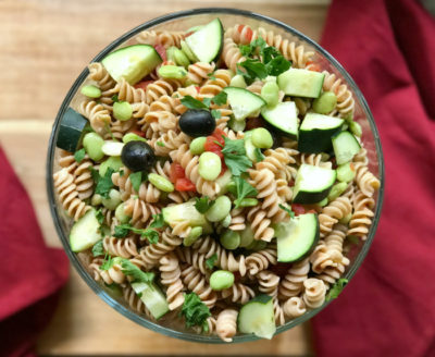 Whip up this Vegan Oil Free Greek Pasta Salad recipe full of Mediterranean flavors in just 30 minutes for a family-style meal everyone will rave about. Perfect for dinner, potlucks, or picnics!