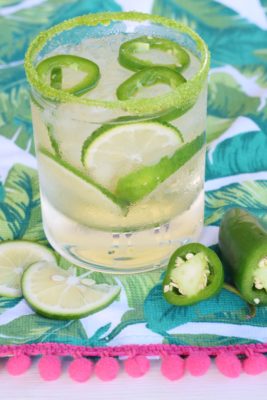 This Jalapeño Limeade Cocktail recipe is equal parts sweet, sour, and spicy - a triple threat in the world of craft cocktails! This lime-vodka based cocktail uses fresh fruit and veggies to make it a unique taste explosion!
