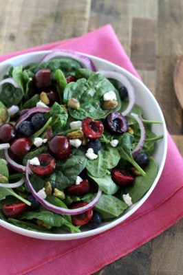 Turn your seasonal farmers market produce into this delightful Cherry Goat Cheese Spinach Salad this weekend. Fresh, tart cherries, tangy goat cheese, and salty pistachios pair together in a way guaranteed to impress even your pickiest guests.
