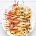 These delicious Baked Rosemary Vegetable Skewers made with garden fresh summer vegetables are the perfect way for you to enjoy seasonal produce. You can bring them to any summer gathering or enjoy them as a unique way to serve vegetables at dinner.