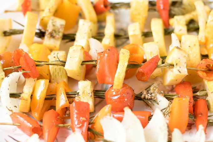 These delicious Baked Rosemary Vegetable Skewers made with garden fresh summer vegetables the perfect way for you to enjoy seasonal produce.