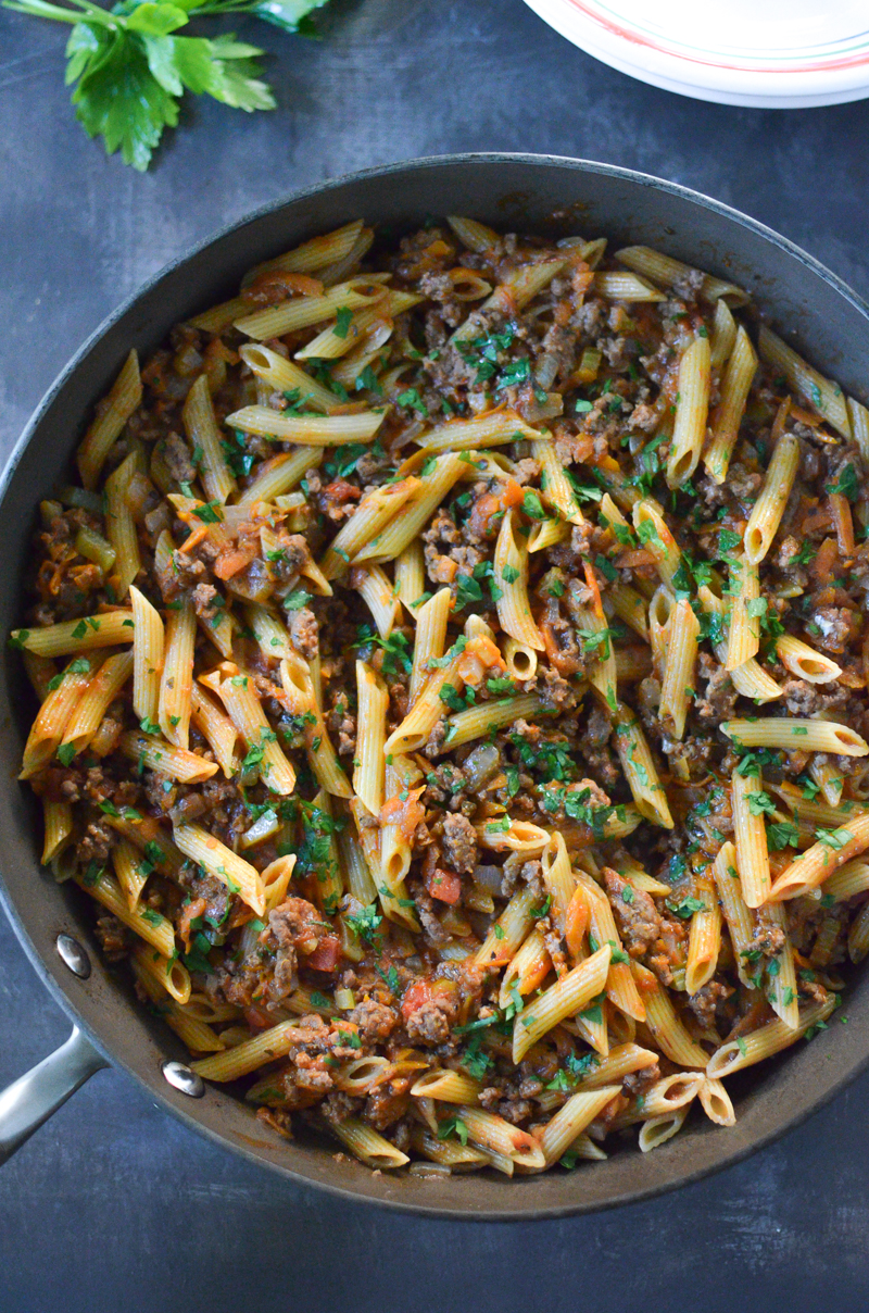 This One-Pan Beef Penne Bolognese recipe is a 30-Minute Meal packed with ground beef, penne pasta, and plenty of delightful vegetables. This dish needs to be on your dinner table tonight!
