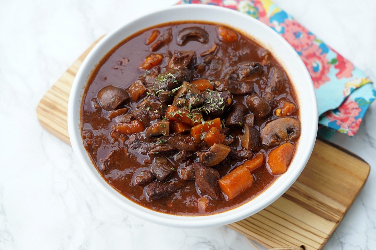 Your family will love this Instant Pot Beef Bourguignon recipe full of flavor and made in less than an hour. It's a modern take on Julia Child's classic!