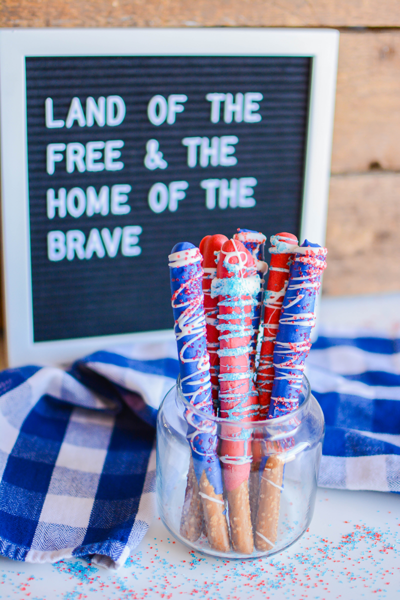 You need these Patriotic Candy Dipped Pretzels at your Fourth of July gathering this year! Simple to make, perfectly patriotic, and sure to be loved by kids and adults alike.