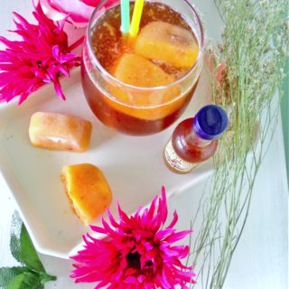 This is not your mama's sweet tea, y'all. This remarkable Sweet Tea Cocktail recipe combines your mama's favorite home brew with fresh peaches and rum. This all-star recipe will become your new summer obsession!