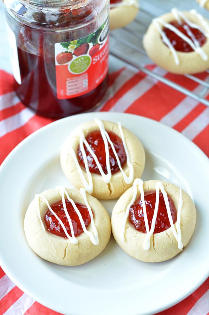 Snack time will never be the same when you whip up these deliciously easy, crispy, buttery Strawberry Jam Thumbprint Cookies this week. These melt-in-your-mouth cookies are perfectly soft, irresistibly sweet, and are made with only seven ingredients!