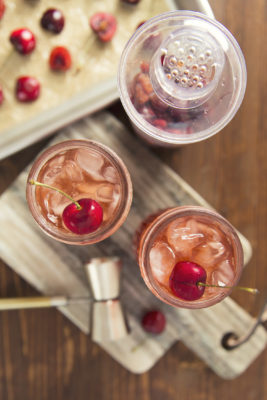This week's happy hour at home begs you to make this seasonal Cherry Bourbon Smash Cocktail recipe. Fresh, tart cherries pair beautifully with quality bourbon for this crowd-pleasing drink.
