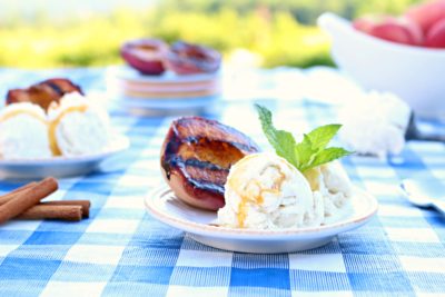 You need to whip up a batch of these Brown Sugar Cinnamon Grilled Peaches for your friends and family. This simple five-ingredient recipe is the perfect summer vacation dessert.