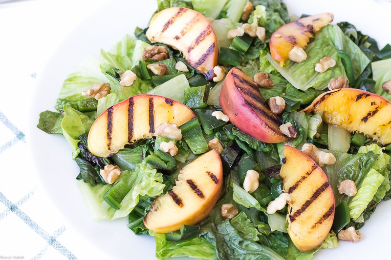The days are getting shorter but you still have time to whip up these five summertime Grilled Peach Recipes just in time to celebrate National Peach Month.
