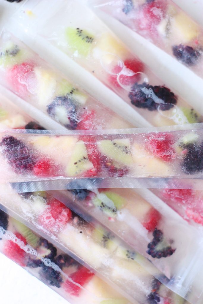 These Fresh Fruit Coconut Water Pops are a magical treat that's simple to make, delightfully refreshing, and bursting with fresh, fruity flavors. Ditch the sugary store-bought pops in favor of this healthier classic!