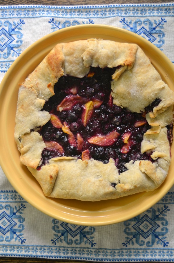 A mouthwatering and surprisingly simple dessert, this Rustic Dairy-Free Peach Blueberry Tart capitalizes on the deliciously-fresh, farmers market fruit!