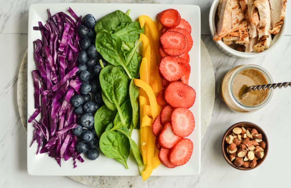 This colorful Rainbow Summer Salad recipe comes together with odds and ends from your refrigerator. Let us show you just how well you can eat on vacation!