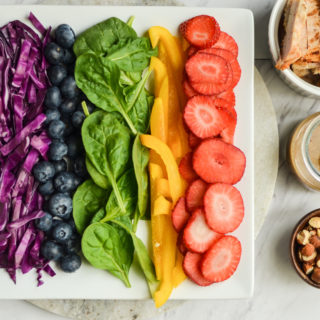 You will love how this colorful Rainbow Summer Salad recipe comes together with the odds and ends from your refrigerator. Let us show you just how well you can eat even while away on vacation!