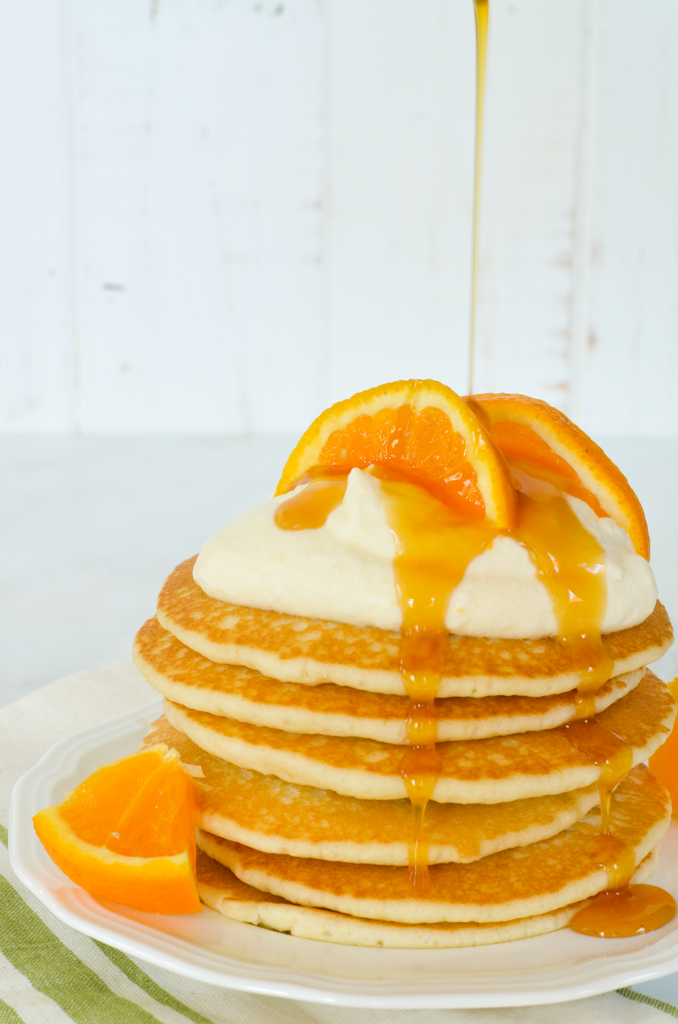 These Crepe Suzette Inspired Pancakes or Shortstack Suzette is a recipe inspired by one of home cooking's greatest heroes, Julie Child. Combine the luscious flavors of citrus and liqueur for an elegant Sunday brunch!