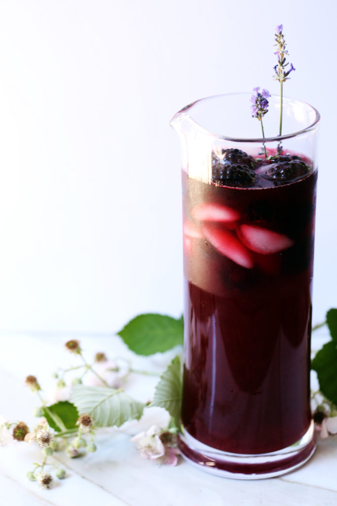Spotlight this Iced Blackberry Infused Earl Grey Tea with its rich, plum color and sweet, bright flavor as a beautiful addition to your summer table.