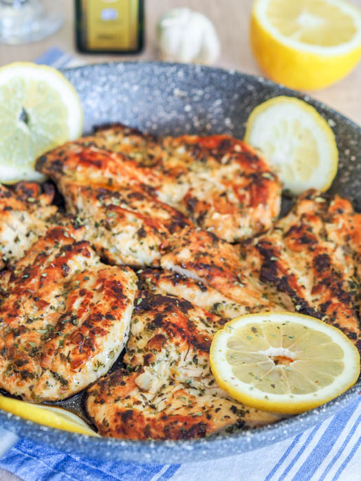 This bright, bold Mediterranean Chicken Breasts recipe full of lemon, oregano, and garlic is perfect for your weekday sandwiches, salads, and bowls.