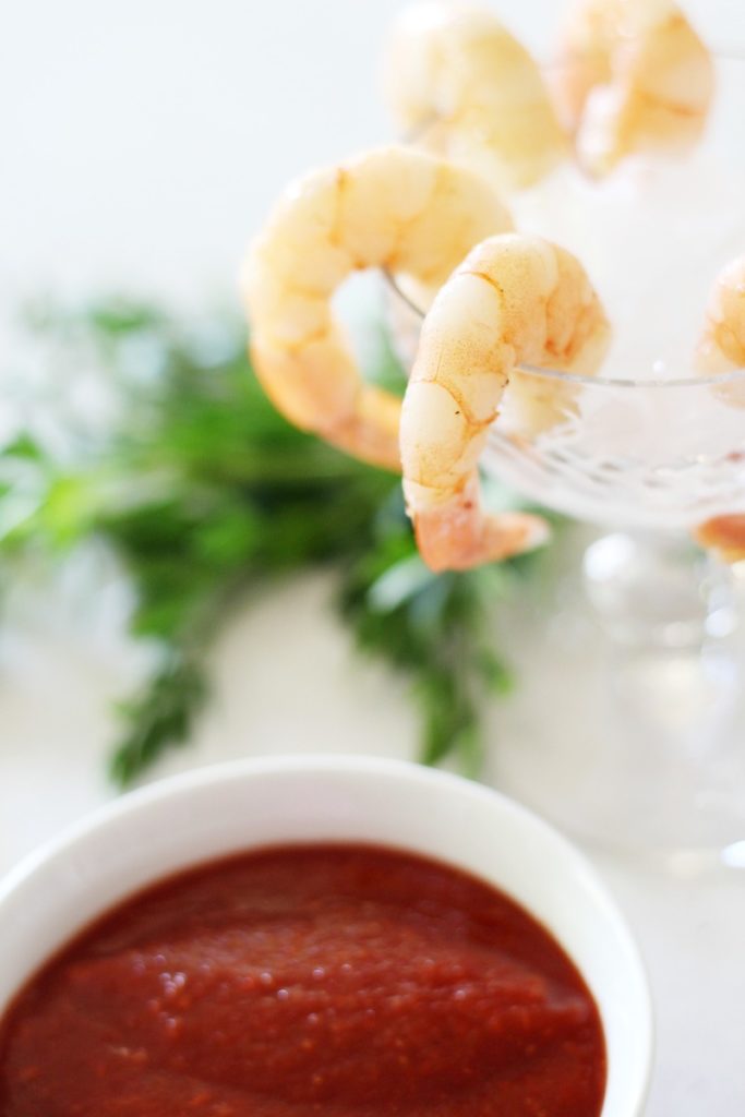 You will be all set for entertaining company once you whip up the best Spicy Garlic Shrimp Cocktail with a simple Two-Ingredient Cocktail Sauce recipe!