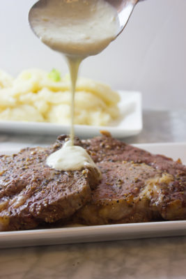 Enjoy a romantic dinner for two with this Pan-Seared Ribeye Steak with Creamy Gorgonzola Sauce. This savory steak with creamy cheese sauce will bring out the romance in any date night at home.
