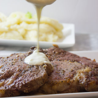 Enjoy a romantic dinner for two with this Pan-Seared Ribeye Steak with Creamy Gorgonzola Sauce. This savory steak with creamy cheese sauce will bring out the romance in any date night at home.