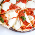 It will feel like you are taking a stroll through Italy when you taste this authentic Italian Margherita Pizza made with a handful of simple ingredients.