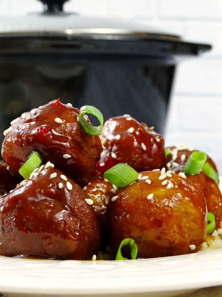Combine the flavors of Asian cuisine with hearty meatballs in this Slow Cooker Asian-Inspired Meatballs recipe. This one-pot meal is perfect for busy weeknights when you want to mix it up for dinner!