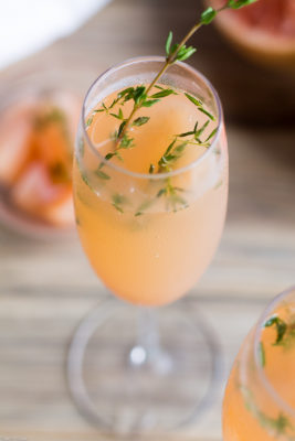 Elevate your at-home Sunday Brunch experience when you whip up this 4-Ingredient Grapefruit Thyme Mimosa. The secret to this cocktail will impress your friends and delight their senses!