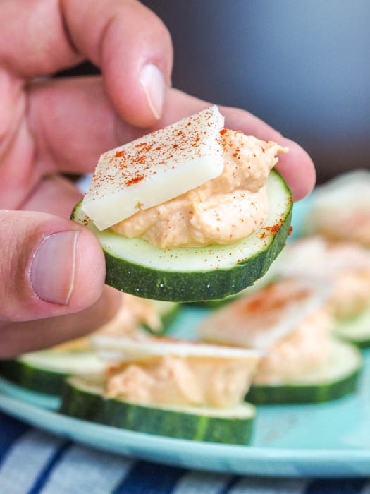 Move over high-carb, unhealthy tailgate appetizers, this Low-Carb Cucumber Hummus Bites recipe is about to win the game! Made with only three key ingredients, it's the perfect bite-sized appetizer for any occasion!