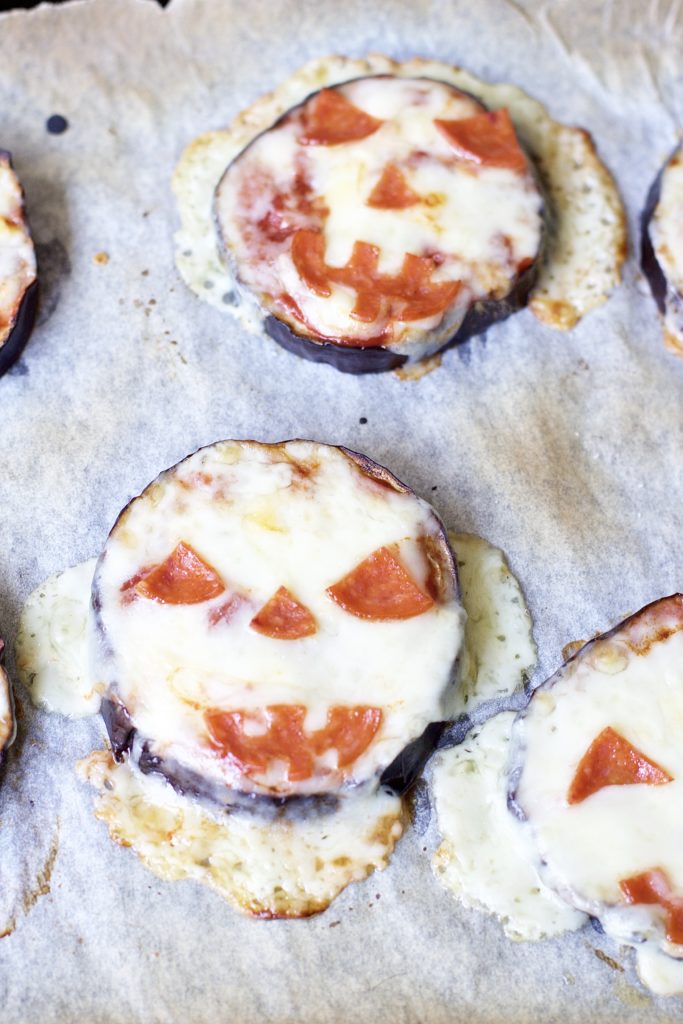 Satisfy all of the ghouls in your life this Halloween when you make these spooky Eggplant Jack-O-Lantern Mini Pizzas for your fright fest. Simple to assemble, and ready in less than 30 minutes, these are perfect for getting the little ones involved.
