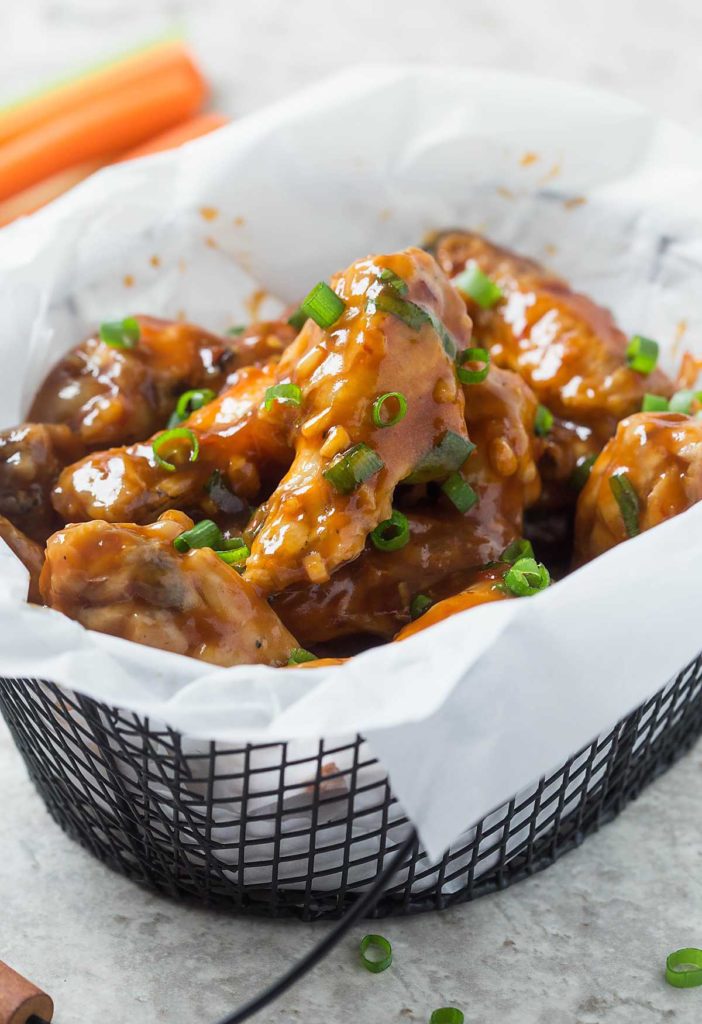 Nothing beats these Oven Baked Chicken Wings served with a finger-licking, homemade Asian Sauce when you're entertaining! This healthier classic is the perfect crowd-pleasing appetizer; no frying required.