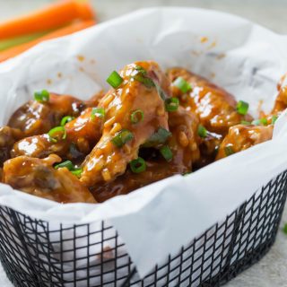 Nothing beats these Oven Baked Chicken Wings served with a finger-licking, homemade Asian Sauce when you're entertaining! This healthier classic is the perfect crowd-pleasing appetizer; no frying required.