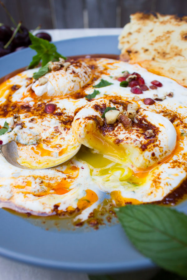 Here's a totally new way to enjoy poached eggs--creamy, smooth, buttery, and absolutely luscious Turkish Poached Eggs over Yogurt. Also known as Cilbir, this is a classic Turkish breakfast dating back to the 15th century that will tantalize your palate!
