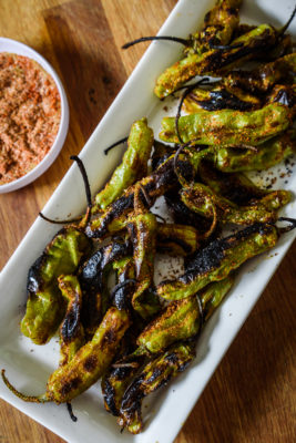 You need these Southwest Blistered Shisito Peppers to get your next party started! Japanese shisito peppers are paired with southwest-inspired spices for an amazing fusion of flavors. Vegan, gluten-free, and Ketogenic Diet friendly!