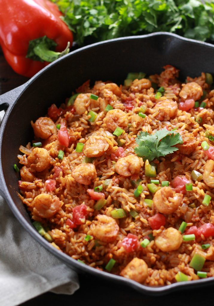 The next time you are scrambling for a delicious meal at the end of a long day make this quick and easy One Pot Shrimp Taco Skillet with Rice.