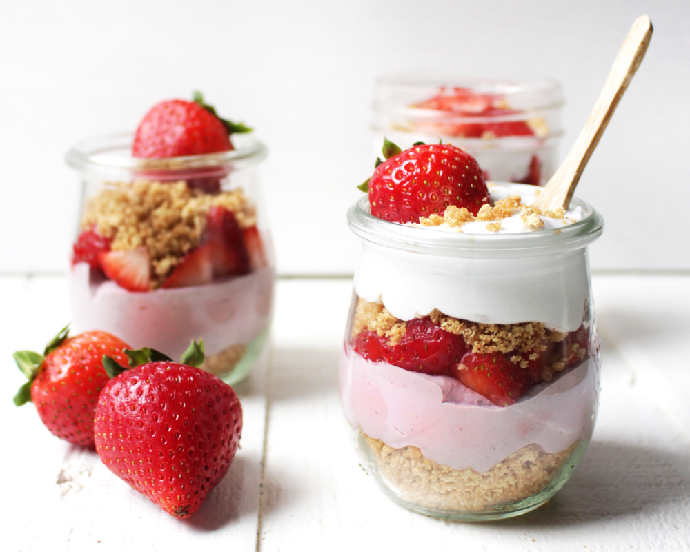 No-Bake Vegan Strawberry Cheesecakes in a jar with graham cracker crust, creamy strawberry cheesecake, and endless toppings will leave your tastebuds happy!