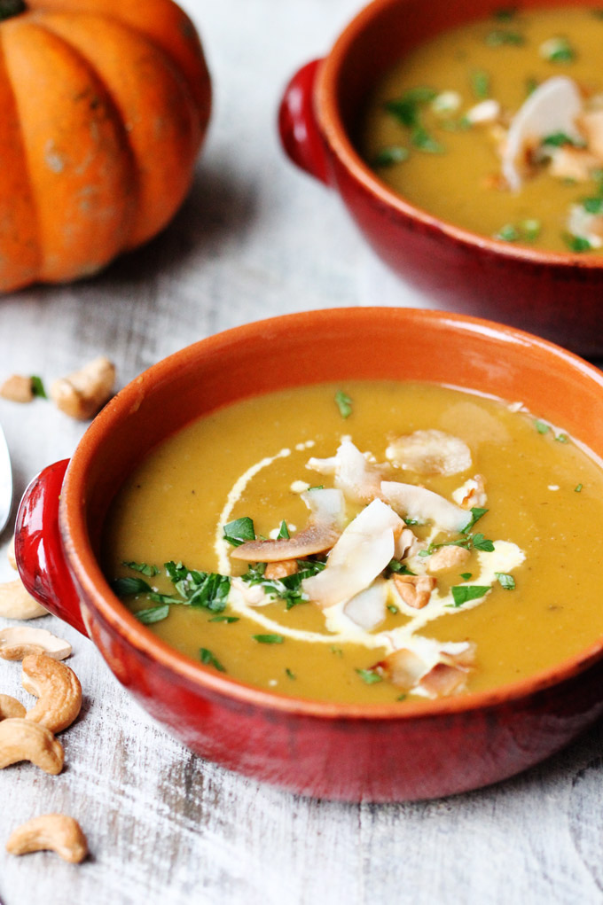 This Curried Butternut Squash Bisque with Roasted Cashews and Coconut Flakes is warm and comforting. Cozy up by the fireplace on a chilly evening and enjoy all of the flavors of the season.