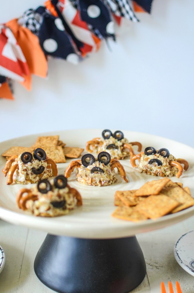 Get creative in the kitchen then dazzle guests this fall when you serve these super festive Halloween Cheese Ball Creepy Crawlers; easy party appetizers.