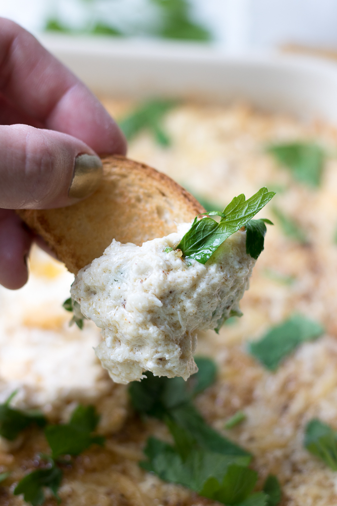 This Creamy Cheesy Crab Dip recipe uses Old Bay seasoning and two kinds of cheeses to create an irresistible appetizer that's ready in 30 minutes.