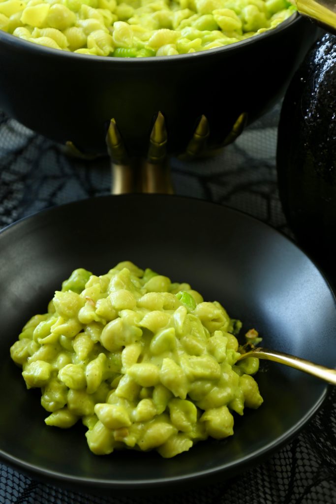 This Halloween-Inspired Toxic Mac N Cheese is a kid-friendly side dish perfect for your Halloween dinner or party. This homemade mac n cheese, with its toxic green color, is as fun to make as it is to eat!