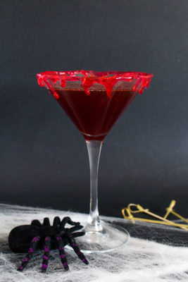 This Cranberry Halloween Bloody Martini is made with cranberry purée, vodka, and sweet vermouth. This spooky twist on the classic Vodka Martini will be a hit at all of your adults-only parties this year!