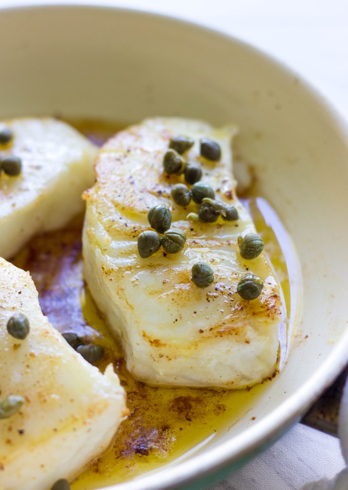 Need a savory dinner in under 20 minutes? This Pan Seared Sea Bass with Brown Butter Caper Sauce is easy to prepare and packed with unbelievable flavor!