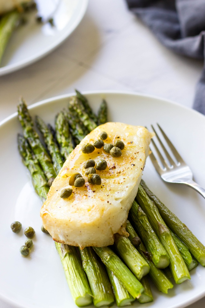Need a savory dinner in under 20 minutes? This Pan Seared Sea Bass with Brown Butter Caper Sauce is easy to prepare and packed with unbelievable flavor!