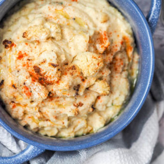 This 5-Ingredient Vegan Pumpkin Cauliflower Mash is a gluten-free side dish you need to try. Brimming with the flavors of fall and much more delicious and satisfying than boring mashed potatoes!