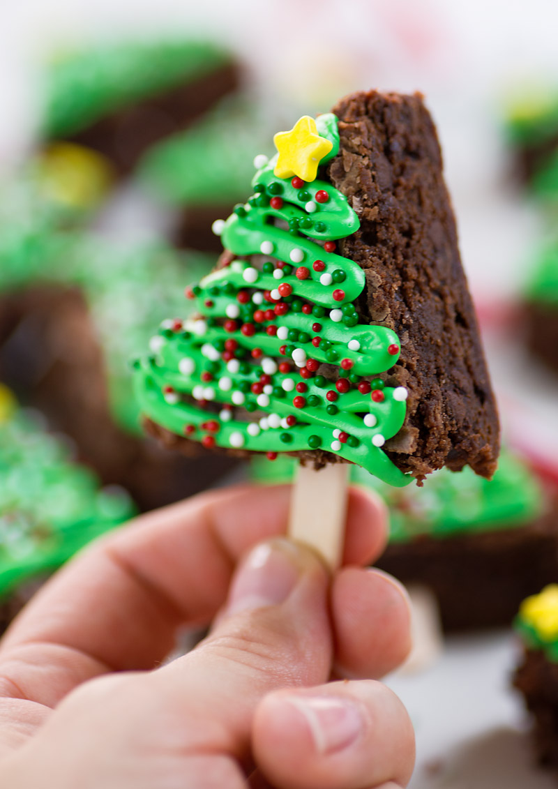It's the most wonderful time of the year, and it's time to celebrate the season with these easy Christmas Tree Brownie Pops. Simple to make, and fun to eat, this festive dessert will be a hit at any holiday event!