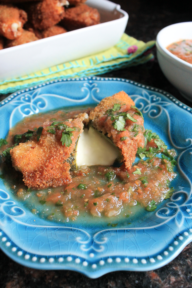 Do you love chile relleno from your favorite Mexican restaurant? If so, you'll be delighted with these Fried Chile Relleno Mini Bites! Mozzarella is wrapped in roasted poblano peppers, breaded, and fried to perfection!