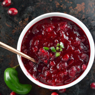 If you really want to impress your holiday guests, serve this homemade sweet and spicy Jalapeño Cranberry Sauce recipe packed full of festive heat.