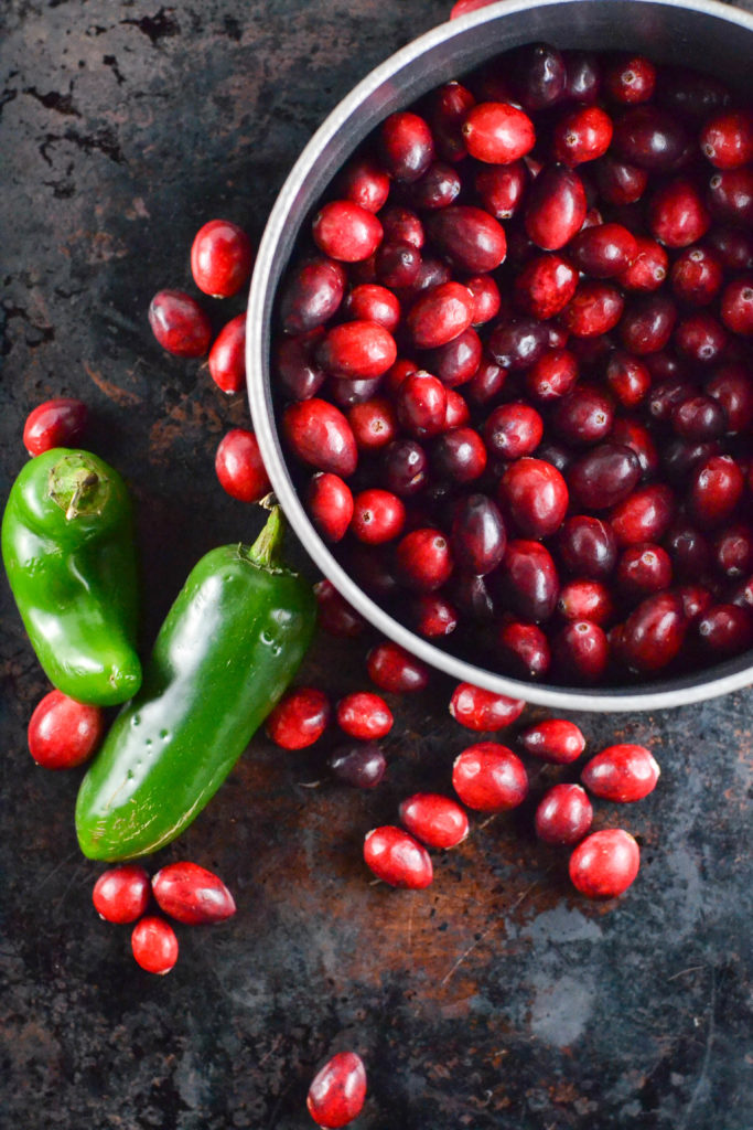 If you really want to impress your holiday guests, serve this homemade sweet and spicy Jalapeño Cranberry Sauce recipe packed full of festive heat.