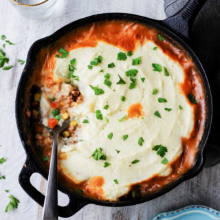 This One-Pan Skinny Shepherd's Pie recipe has all of the flavors of the traditional dish without all of the fat and carbs. This healthier classic uses ground turkey and a delightful cauliflower-potato mash.