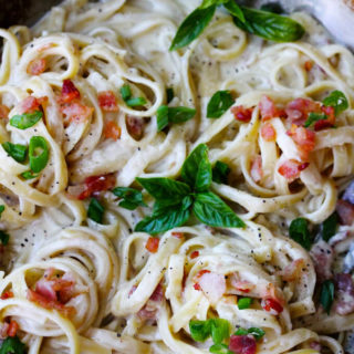 This indulgent Three Cheese Fettuccine with Bacon is the perfect cheat day meal! Creamy, velvety, and delicious, this meal comes together in less than 30 minutes and the taste is simply out of this world!