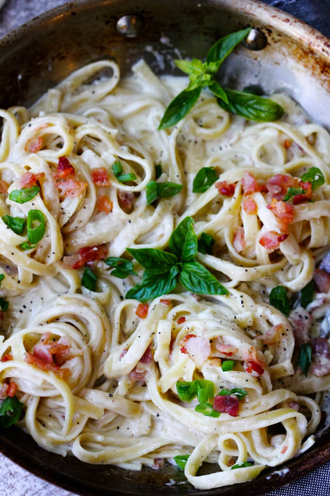 This indulgent Three Cheese Fettuccine with Bacon is the perfect cheat day meal! Creamy, velvety, and delicious, this meal comes together quickly and the taste is simply out of this world!